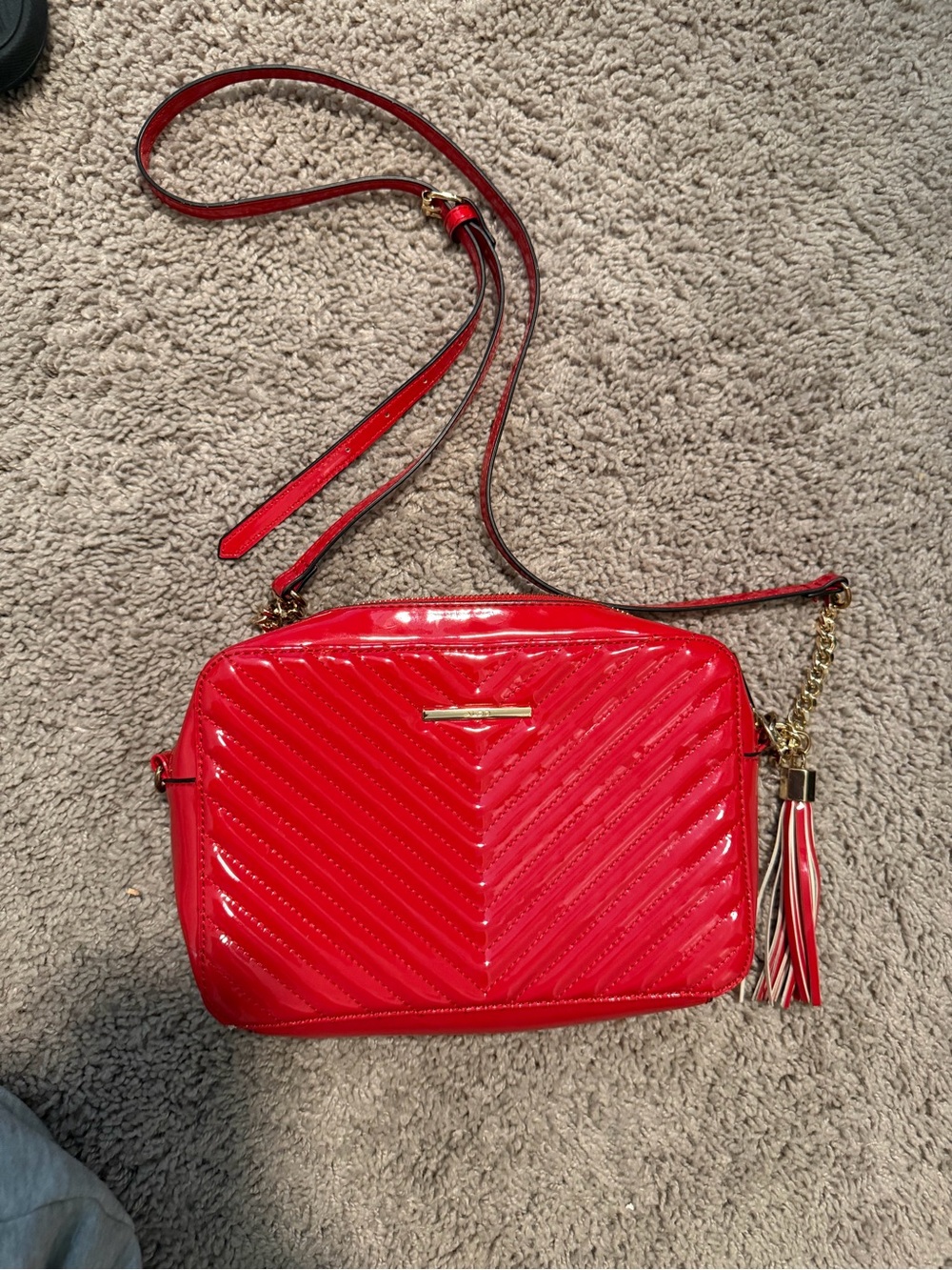 Aldo Red Patent Chevron Crossbody with Tassel